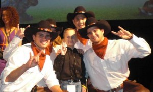 A group of men in cowboy hats and shirts.